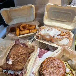Panko Onion Rings, garlic parm fries, Reuben, olive burger