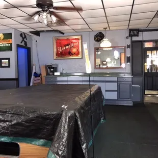 Pool table covered and limited seating