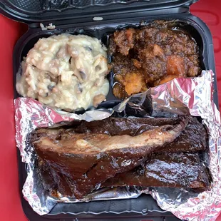 BBQ Pork Ribs; Rice and Beans with Gravy; Candied Yams