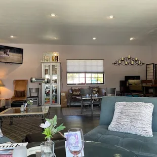 This wine room feels like a living room. Love it!