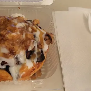 Cinnamon Roll stuffed with caramel apple.  Yum!