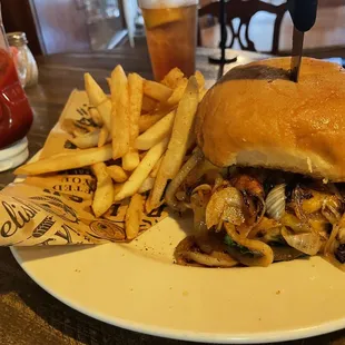 A HUGE!! cheddar cheese with a grilled onion, burger, and fries!!!