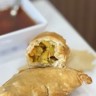 Inside the Curry Puff: a flaky dry curry empanada; pretty good and pairs well with sweet sauce