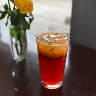 Thai Ice Tea: on the sweeter side but pairs well with the bold flavors of their food.