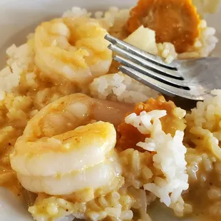 a plate of shrimp and rice