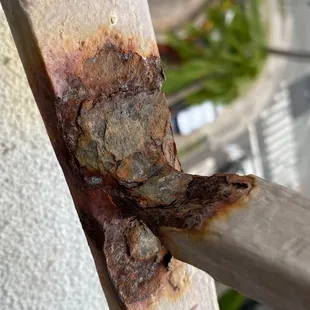 Rust from the constant drip of the AC from the room above