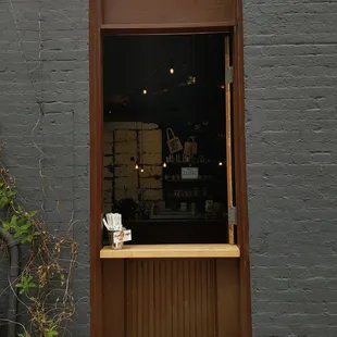 The window to pick up your order during covid. So less people are inside waiting for drinks.