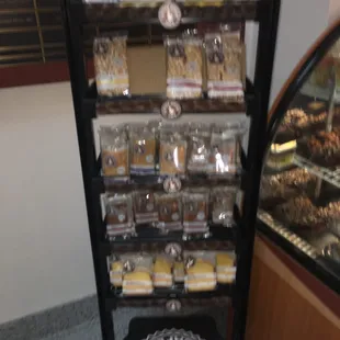 a display of pastries and cakes