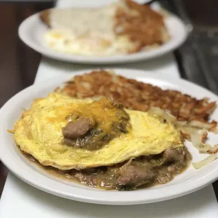 two plates of breakfast food