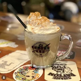 a cup of coffee with whipped cream