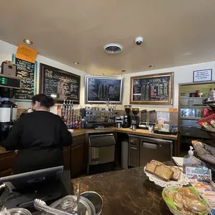 a man working in a coffee shop
