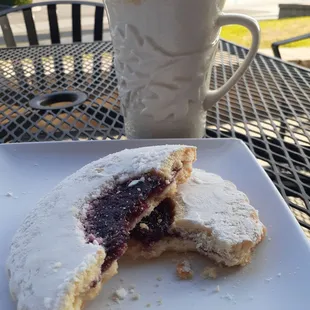 Medium Latte and a raspberry cookie