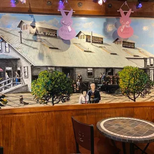 a mural of a restaurant