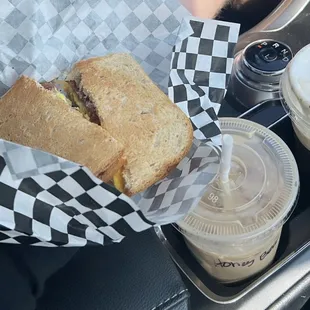 Iced honey bear latte, cold brew w/ maple cinn cold foam and a bacon, egg, cheese on wheat toast