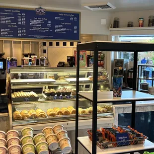 a woman standing in front of the counter