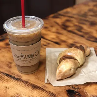 French vanilla cold brew with a ham and gouda croissant