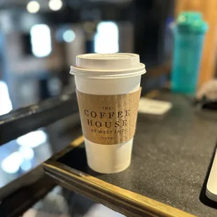 Latte. Sorry I ate my almond croissant too fast to get a photo of it.