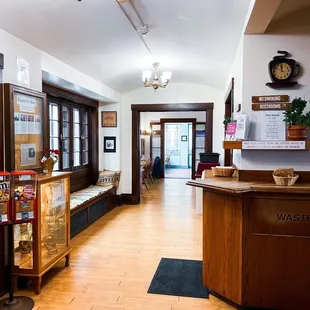 a coffee shop with wooden floors