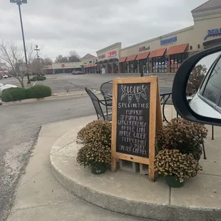 a sign on the corner of a street