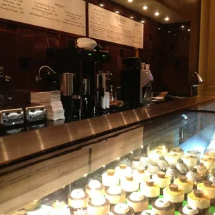 a variety of cupcakes on display