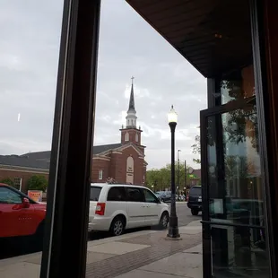 a view of a church through a window