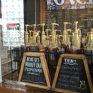 a chalk board with a sign that says tea