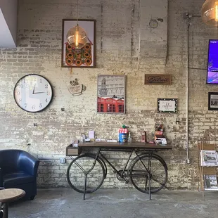 a television mounted on a brick wall