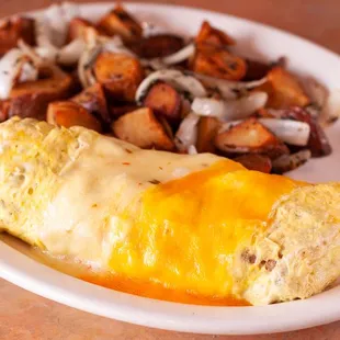 an omelet and potatoes