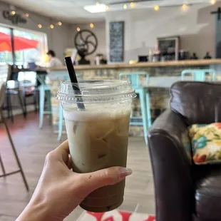 Iced Matcha with almond milk cold foam and a shot of espresso