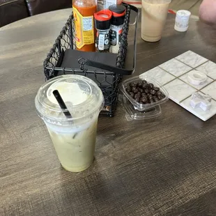 Iced Caramel macchiato and chocolate covered coffee beans