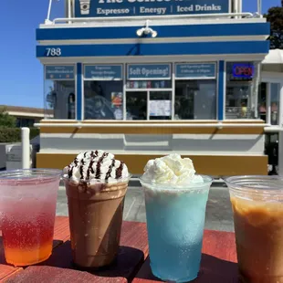 From left to right: Sunset Vibes, Mocha Frappe with Whipped Cream, Surf Rider blended with Whipped Cream, French Vanilla latte
