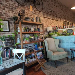 They have small tables, big tables, individual comfy chairs and a big couch. Free book library, games, and puzzles