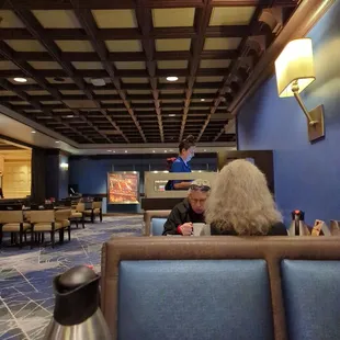 The employee standing in the background wears heavy perfume