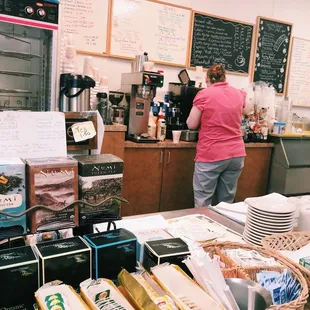 a woman standing at the counter