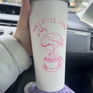  person holding a cup of coffee