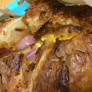Toasted croissant with ham, egg, &amp; cheese. It got too brown a bit, but still tasted great!