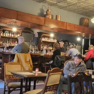 people sitting at the bar