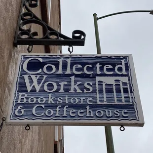a blue and white sign