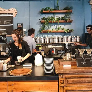 Iconik Coffee Roasters- follow the smell of coffee behind the books.