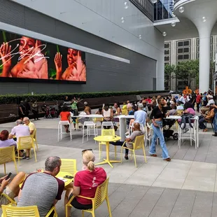 Outside on The Collective Food Hall at Coda&apos;s outdoor patio and breezeway.