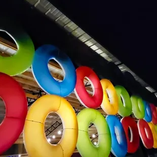 a row of colorful doughnuts