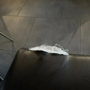 Tear in vinyl bench seating
