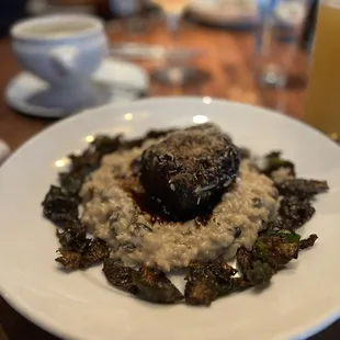 Braised Beef Short Ribs with a veal reduction , parmesan-chive risotto . roasted brussels leaves and mushrooms