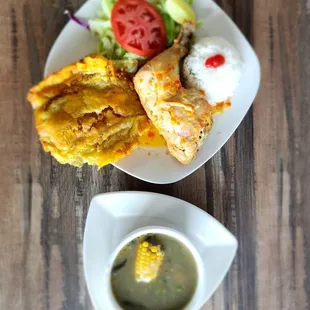 a plate of food and a bowl of soup