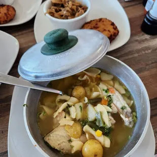 a bowl of chicken noodle soup