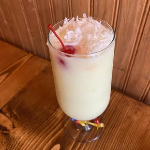 a drink in a tall glass