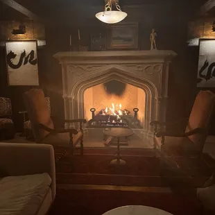 Amazing fireplace located on the cocktail side of the bar