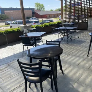 tables and chairs on the patio