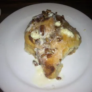 Cinnamon roll with nuts.