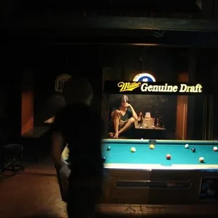 a pool table with a pool ball on it